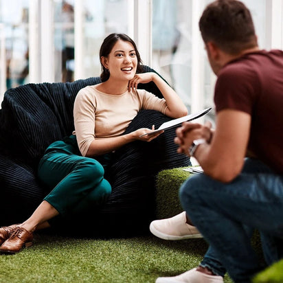 teenagers in class sitting on beanbags